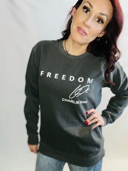 woman in pepper sweater in front of white background